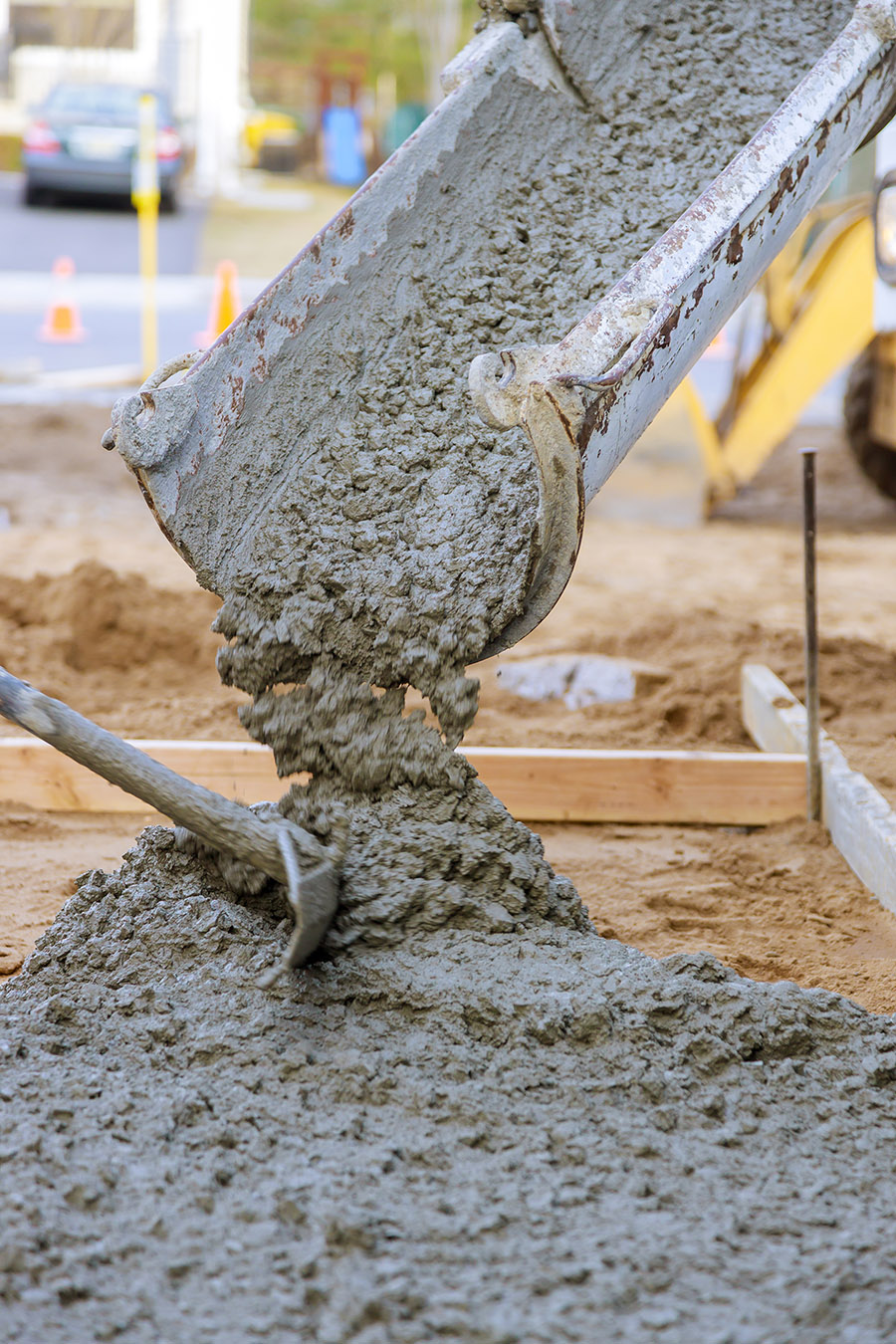 Concrete-being-poured-from-a-mixer-truck-for-concrete-slab-foundation